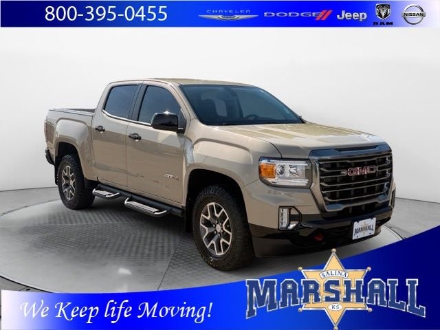 2022 GMC Canyon AT4 w/Leather in Desert Sand Metallic — front three-quarter view