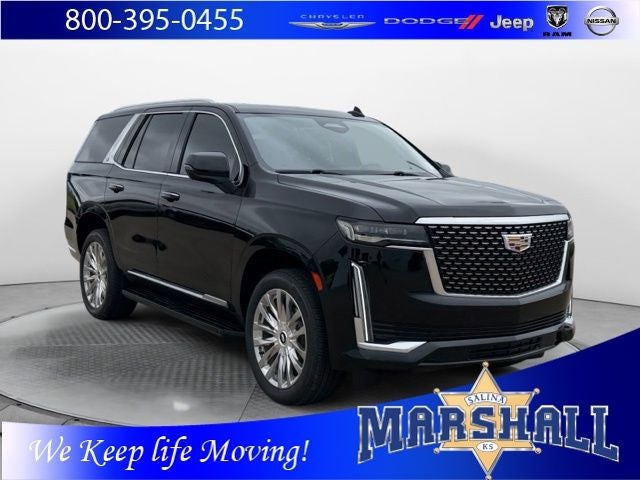 2021 Cadillac Escalade Premium Luxury in Black Raven — front three-quarter view