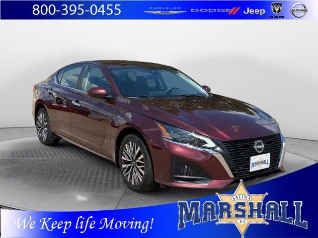 2023 Nissan Altima 2.5 SV in Garnet Pearl Metallic — front three-quarter view