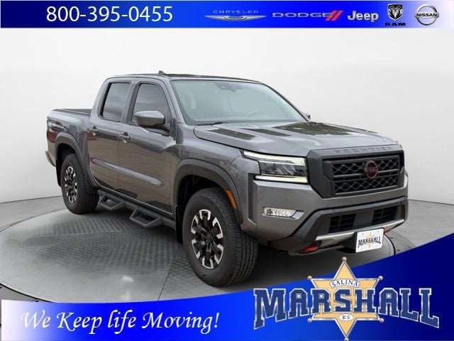 2022 Nissan Frontier PRO-4X in Gun Metallic — front three-quarter view