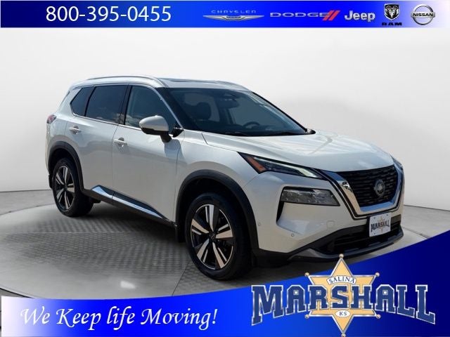 2023 Nissan Rogue SL in Pearl White Tricoat — front three-quarter view