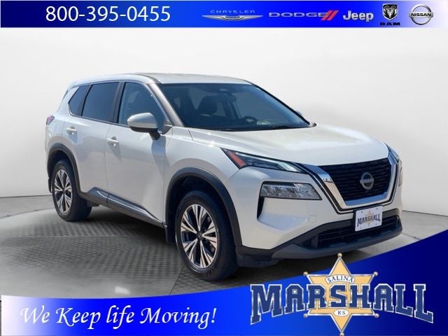 2023 Nissan Rogue SV in Pearl White Tricoat — front three-quarter view