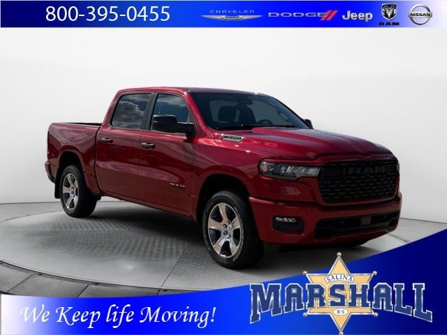 2026 RAM 1500 RAM 1500 EXPRESS CREW CAB 4X4 5'7' BOX in Molten Red Pearl-Coat Exterior Paint — front three-quarter view