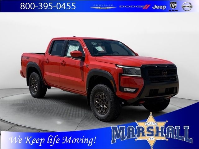 2026 Nissan Frontier PRO-4X w/R Package in Afterburn Orange — front three-quarter view