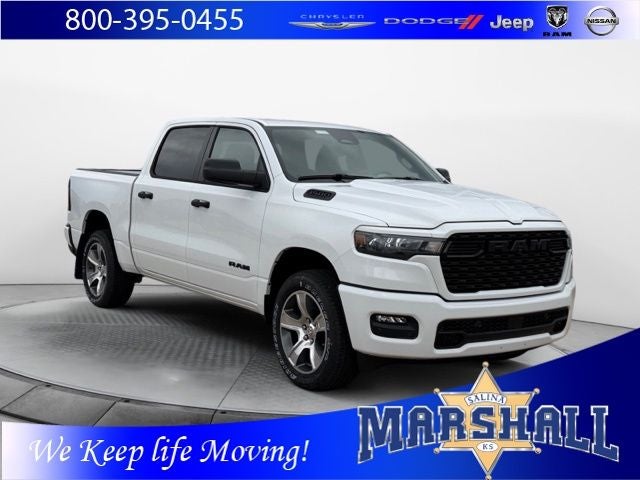 2026 RAM 1500 RAM 1500 EXPRESS CREW CAB 4X4 5'7' BOX in Bright White Clear-Coat Exterior Paint — front three-quarter view