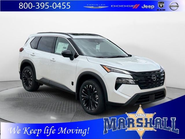 2026 Nissan Rogue Dark Armor in Everest White Pearl Tricoat — front three-quarter view